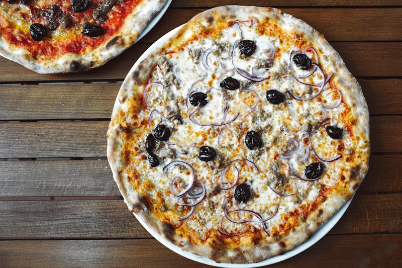 BBQ Chicken marcos pizza with caramelized onions